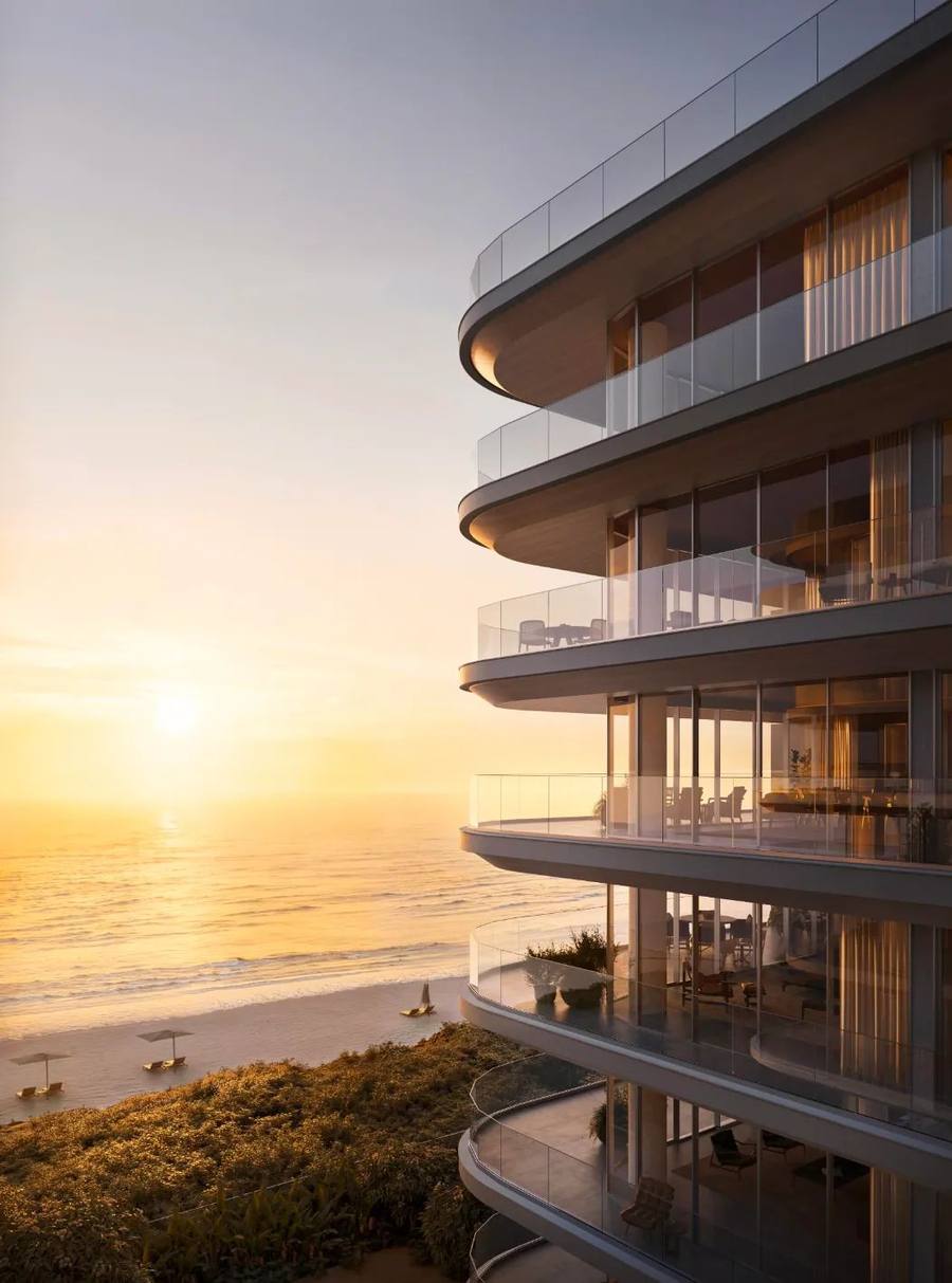 Modern beachfront residence at sunset